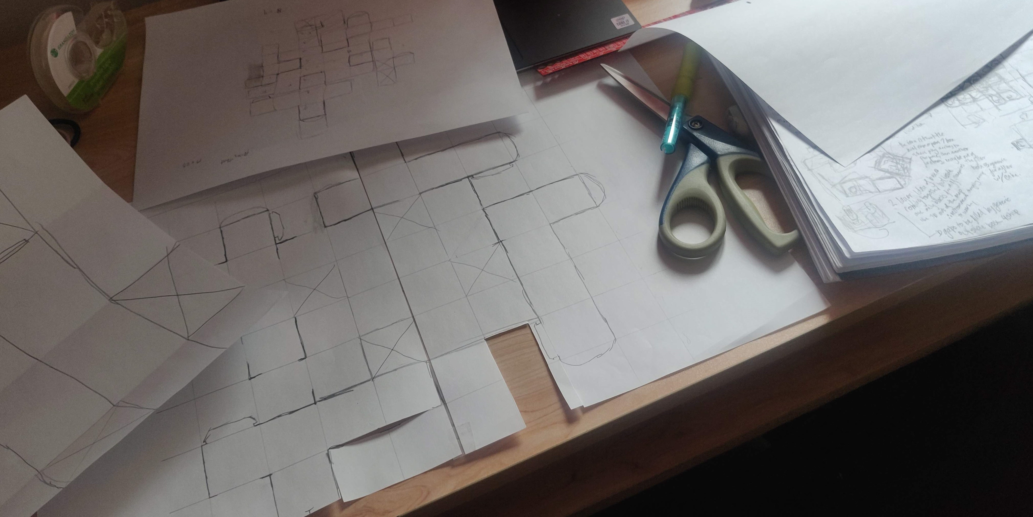 Late night process of configuring the dieline for our main component, the roll-out map with 4 compartments and additional reveals